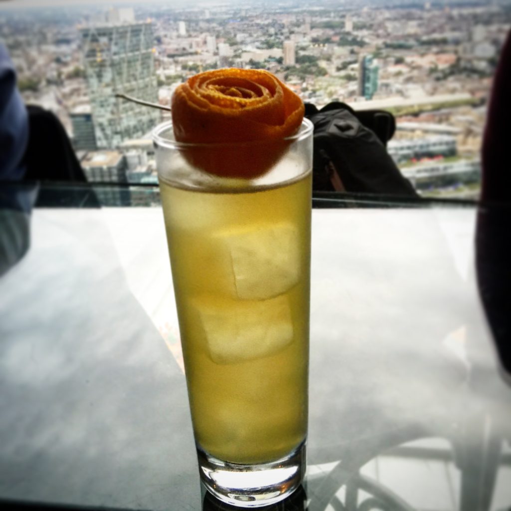 photo of cocktail with a view